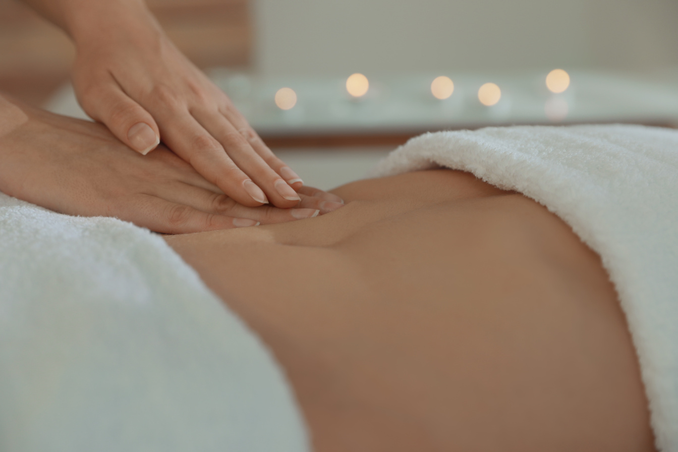 Woman Receiving Professional Belly Massage in Wellness Center, C